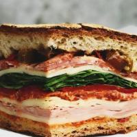 Leonardo’S Mortadella And Ham Sandwich · Leonardo’s romano. Mortadella, ham and fresh mozzarella with slow roasted tomato and a roast...