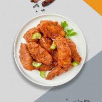 Hot In Nashville Tenders · Fresh chicken wings breaded, fried until golden brown, and tossed in Nashville Hot Sauce. Se...