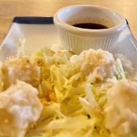 Wasabi Shumai (3Pcs) · Steamed specially pork dumpling with garlic and wasabi served with house soy sauce