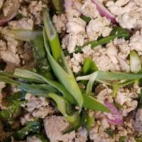 Larb · Your choice of chicken, pork or beef with onions, cilantro, lettuces, in lime dressing and r...
