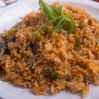 Spicy Basil Fried Rice · Fresh cracked egg, scrambled with onions, bell pepper, basil leaves, wok-fried rice in our c...