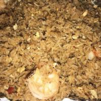 Crab Fried Rice · Fresh cracked egg, scrambled with real crab meat, onions, wok-fried rice in our house-made s...