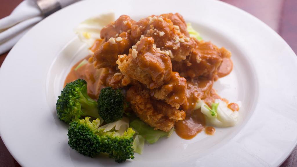 Swimming Angel · Your choice of steam or fried chicken with home-made peanut sauce served with steam broccoli, cabbage, carrot, and steam rice.