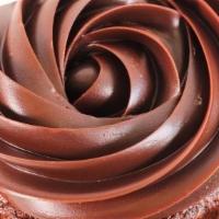 Triple Chocolate Torte (Gf) · Ooey, gooey, rich, and chewy – brownie like cake topped with triple chocolate ganache.
