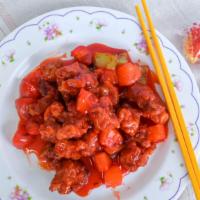 Sweet & Sour Chicken · includes steam white rice