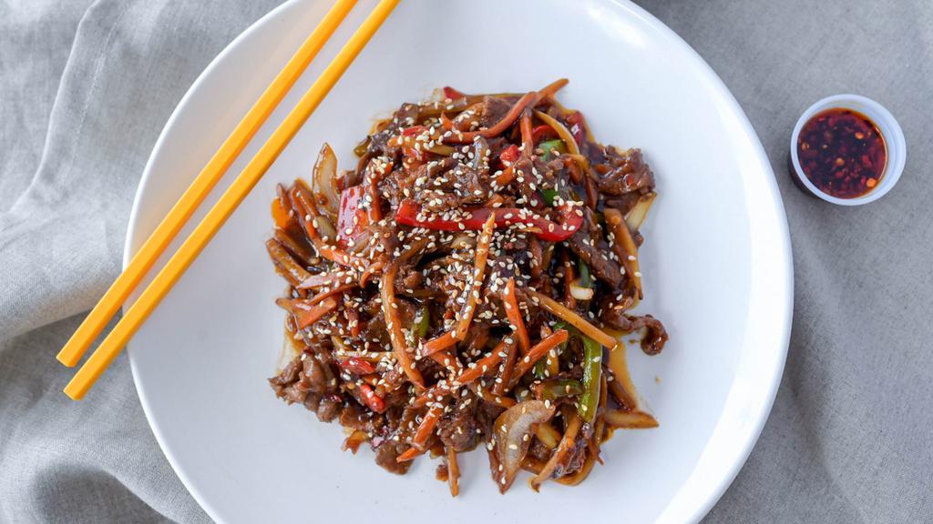 Mongolian Beef · includes steam white rice