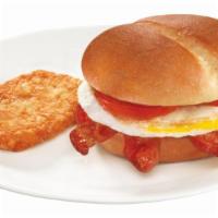 Bet Combo · Bacon, egg, and tomato with mayonnaise on a brioche bun, hash brown, and a regular coffee.