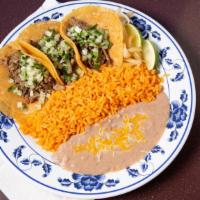 Street Taco Plate · Served with rice beans pico de gallo and corn tortillas.