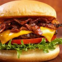House Burger · 7 oz burger with bacon, american cheese, mustard & mayo on a toasted brioche bun. Lettuce, t...