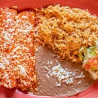 Enchiladas Mexicanas · Three enchiladas filled with queso fresco and topped with our special chile guajillo sauce.