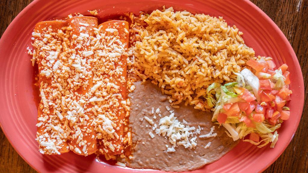 Enchiladas Mexicanas · Three enchiladas filled with queso fresco and topped with our special chile guajillo sauce.