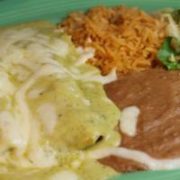 Poblano Enchiladas · Two chicken enchiladas topped with a roasted poblano cream sauce and Monterrey Jack cheese.