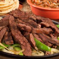 Fajitas (For 2) · Six tortillas. Eat familia-style! Sizzling marinated fajitas with grilled onions and bell pe...