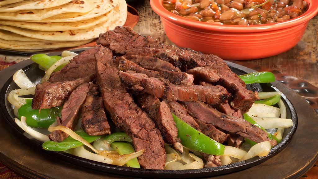 Fajitas (For 2) · Six tortillas. Eat familia-style! Sizzling marinated fajitas with grilled onions and bell peppers. Served with pico de gallo.