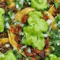 Tacos-Mini · 5 Mexican  beef tacos In corn tortillas with onion-cilantro-Mozzarella Cheese And Avocado.