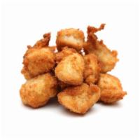 Chicken Bites · Small bites of Chicken, battered and fried to perfection.