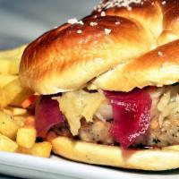 Der Brat Burger · A grilled bratwurst patty topped with marinated sauerkraut, Düsseldorf mustard aioli and pic...