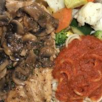 Veal Marsala · Veal scaloppini sautéed with mushrooms in a marsala wine sauce, served with a side of pasta,...