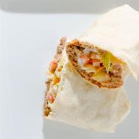 Burrito · Twelve-inch tortilla with your choice of meat served with beans, lettuce, tomato, cheese, an...