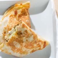 Breakfast Quesadilla · Served with cheese, eggs and your choice of protein.