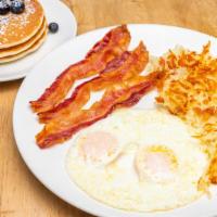 For Dad · Two buttermilk pancakes with two egg any style and three strips of bacon or two patty sausage.