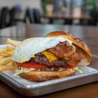 Very Bacon N Egg Burger · Beef patty, cheddar cheese, four slice bacon, over easy egg, mayo.