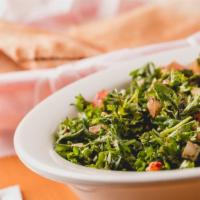 Tabouli · A light and delicious parsley-based salad with cracked wheat, tomatoes, onions and lemon jui...