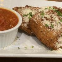 Fried Ravioli · Lightly breaded & fried fresh cheese raviolis, served with our famous  marinara sauce or you...