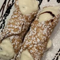Cannoli · Tube-shaped shells of fried pastry dough, filled with a sweet, creamy chocolate chip ricotta...