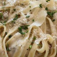 Fettuccine Alfredo · Alfredo sauce made fresh with cream and fresh grated parmesan.