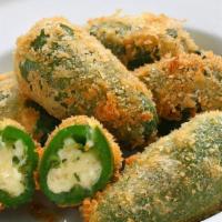Fp'S Cream Cheese Stuffed Jalapenos (8 Pieces) · Jalapeños filled with cream cheese, breaded and deep fried, served with side of ranch.