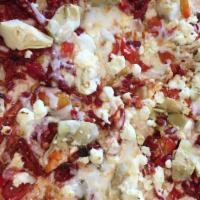 Mediterranean · Sun-dried tomatoes, grilled chicken, artichoke, Feta cheese, roasted red pepper.