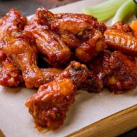 Bbq Crispy Chicken Wings · Tender & Delicious Chicken wings, rubbed with house special seasonings, smothered in BBQ sau...