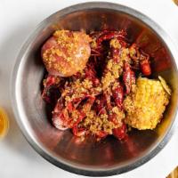 Boiled Crawfish · Crawfish cooked with traditional or garlic butter seasoning.  Choice of mild,  medium, or ex...