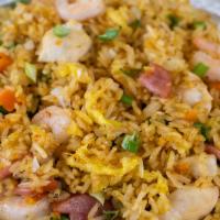 Fried Rice · stir-fried with egg, carrots, peas, and onions. Add chicken, shrimp, or combination for an a...