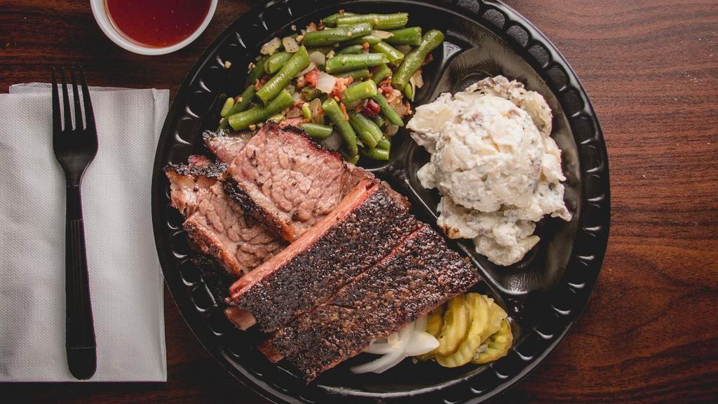 Two Meats Plate · Brisket sausage country or jalapeño pork ribs chicken turkey or pulled pork. served with your choice of 2 sides.