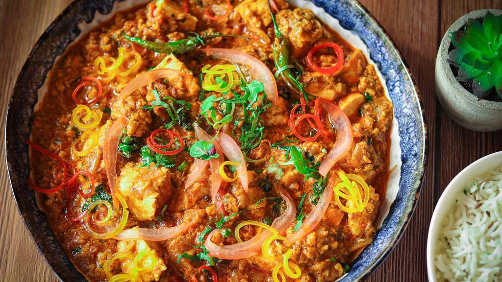 Chicken Raarha Curry · Chicken minced along with tikka in a hearty onion sause. Spicy. Gluten free.