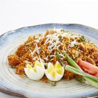 Chicken Tikka Biryani · Basmati rice, chicken, cilantro and mint. Gluten free.