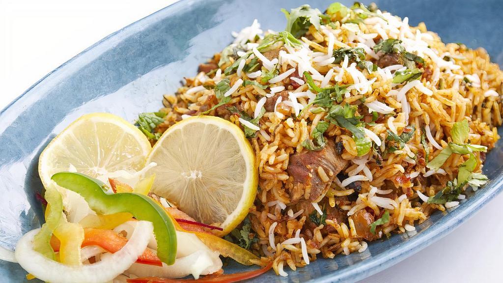 Mutton Biryani · Basmati rice with slow cooked mutton and in-house special spices. Gluten free.