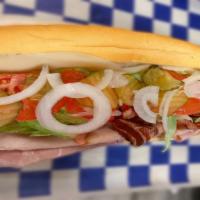 The Club Sub · Served on savory French bread. Ham, smoked turkey, bacon and provolone cheese, mayonnaise, l...