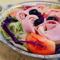 Chef Salad · Served with mix of romaine, iceberg, red cabbage topped with tomatoes, onions, cucumbers, an...