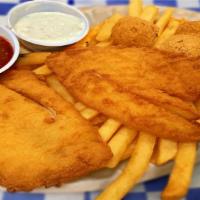 Fish Dinner · Served with French fries & hushpuppies and 1 tartar sauce 2 oz cup.