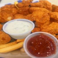 Oyster Dinner · Fried domestic oyster served with 1 tartar sauce 2oz cup. Dinner served with french fries an...