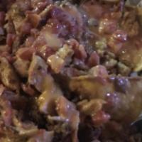 Nachos · A house favorite with refried beans, cheese, and jalapeños. Additional charge for beef or ch...