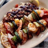 Grilled Shrimp Ka-Bob With Beans & Rice · Served with beans and rice.