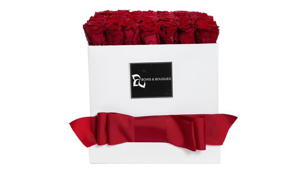 Sydney · Fuschia and lime green colored roses
Box: Extra large white square box
Flowers: Preserved Ecuadorian Roses