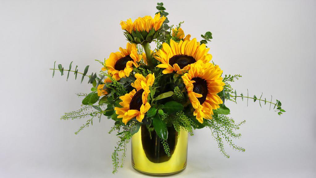 Hello Sunshine! · Hello sunshine! Seasonal flowers with combination of yellow colors is delivered in a majestic, gold glass vase.