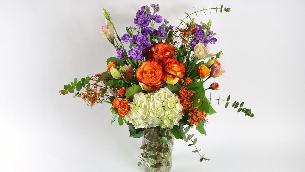 Design Choice - Tall (Colors Of Flowers Can Be Different) · Enjoy with this seasonal design choice flower arrangement delivered in a majestic,  glass vase. Perfect for dinner or coffee table.