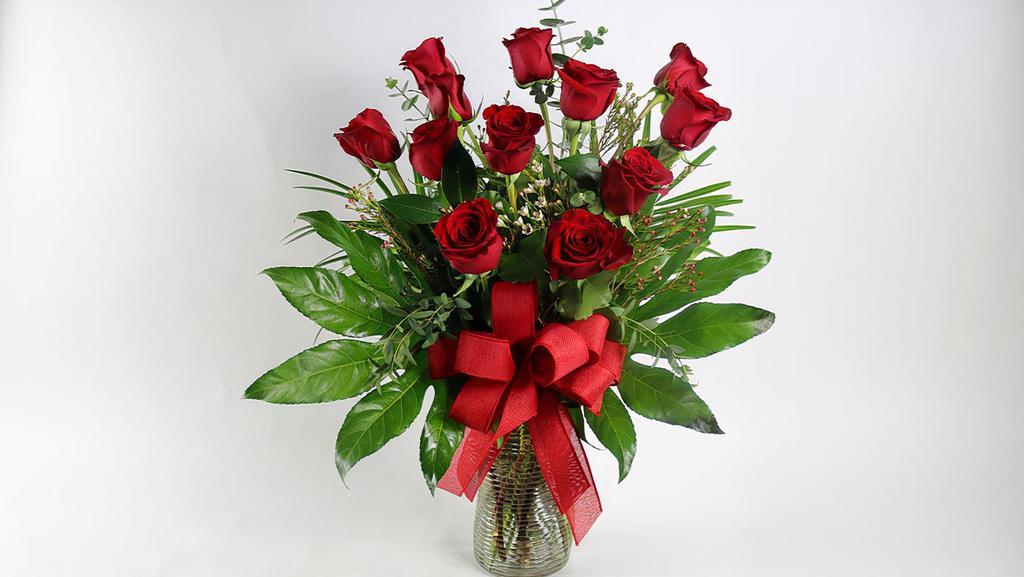 Lovely 12 Roses · Send love with one dozen premium red roses or any color roses designed to give a great impression with beautiful foliage in a clear glass vase.