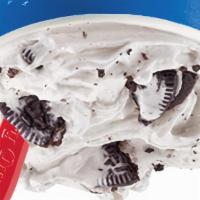 Oreo Blizzard · OREO® cookie pieces blended with creamy vanilla soft serve.
